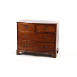 Property of a gentleman - a 19th century mahogany bow-fronted chest of two short & two long drawers,