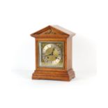 Property of a deceased estate - a late 19th century oak cased mantel clock, the 8-day two train