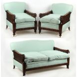 Property of a lady - a good early 20th century bergere three piece suite comprising a pair of