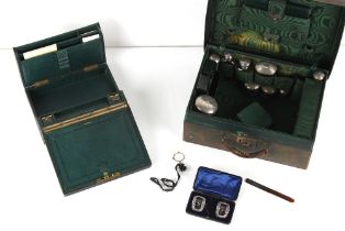 Property of a lady - an early 20th century green morocco leather vanity case with silver topped