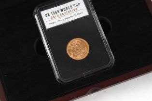Property of a gentleman - gold coin - a UK 1966 World Cup QEII gold full sovereign, in original