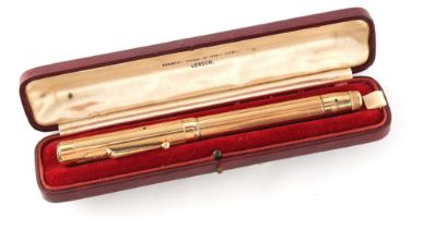 Property of a gentleman - a Mabie & Todd Swan gold plated fountain pen, initialled H.R.B., in