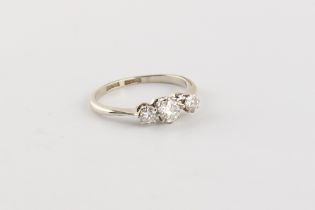 Property of a gentleman - an 18ct white gold & platinum diamond three stone ring, the estimated