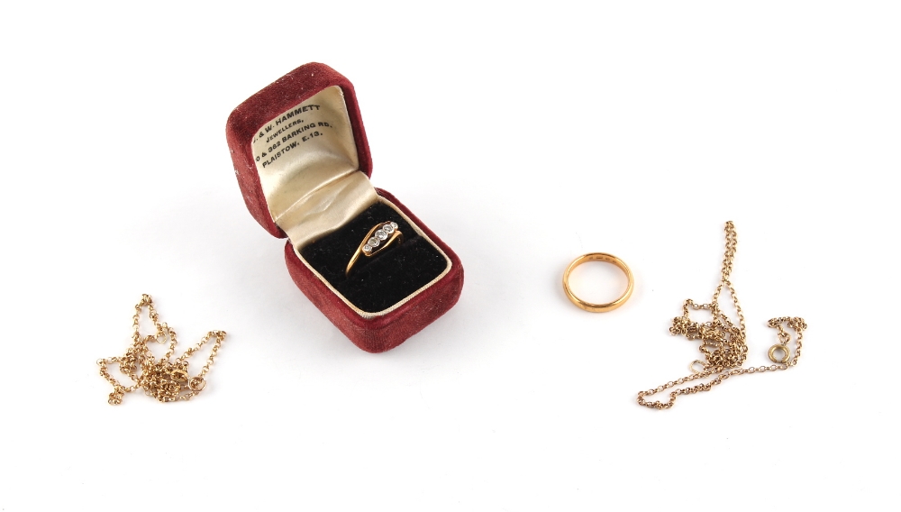 Property of a lady - a 22ct yellow gold wedding band, size K, approximately 4.1 grams; together with