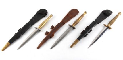 Property of a gentleman - three Fairbairn Sykes second pattern fighting knives, one with rubbed