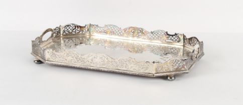 Property of a gentleman - a heavy late Victorian silver plated elongated octagonal tray with pierced