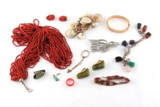 Property of a gentleman - a bag containing assorted costume jewellery including a 15-strand coral