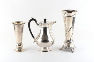 Property of a lady - a silver baluster hot water jug, Sheffield 1931, 9.65ins. (24.5cms.) high;
