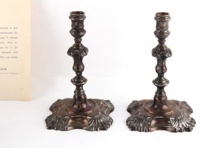 Property of a lady - a pair of silver tapersticks presented to Members of the Livery of the