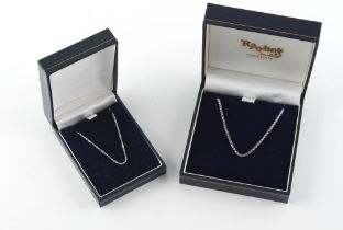 Property of a deceased estate - two boxed 9ct white gold chain necklaces, both 18ins. (46cms.) long,