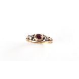 A late Georgian unmarked yellow gold ruby & diamond ring, size R.