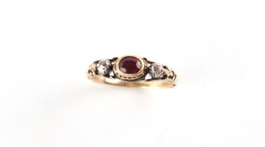 A late Georgian unmarked yellow gold ruby & diamond ring, size R.