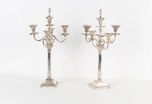 Property of a gentleman - a large pair of silver plated five light candelabra, with flambeau finials