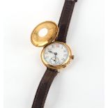 Property of a lady - an early 20th century 18ct gold half hunter cased wristwatch, with subsidiary