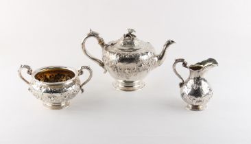 Property of a gentleman - a Victorian silver three piece tea set, faint engraved crest to each,