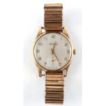 Property of a lady - a gentleman's Garrard 9ct gold cased wristwatch, with 17-jewel movement,