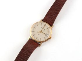 Property of a gentleman - a gentleman's Garrards 9ct gold cased quartz wristwatch with date
