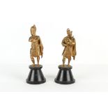 Property of a gentleman - a pair of early 20th century gilt bronze or brass figures of Scottish