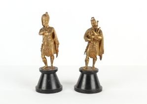 Property of a gentleman - a pair of early 20th century gilt bronze or brass figures of Scottish