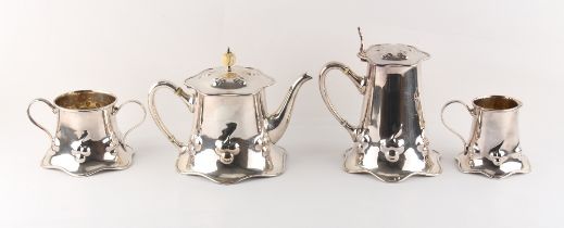 Property of a lady - an early 20th century Scottish Arts & Crafts silver plated four piece tea