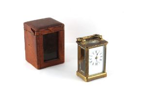 Property of a lady - a late 19th / early 20th century French brass corniche cased carriage clock