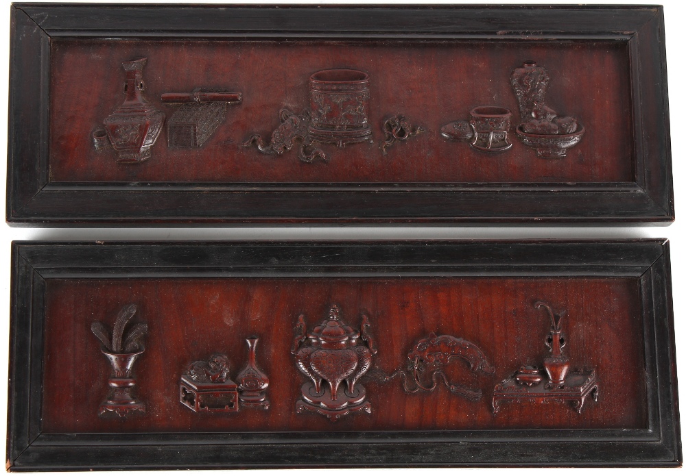 Property of a lady - an unusual pair of late 19th century Chinese carved huanghuali panels, each
