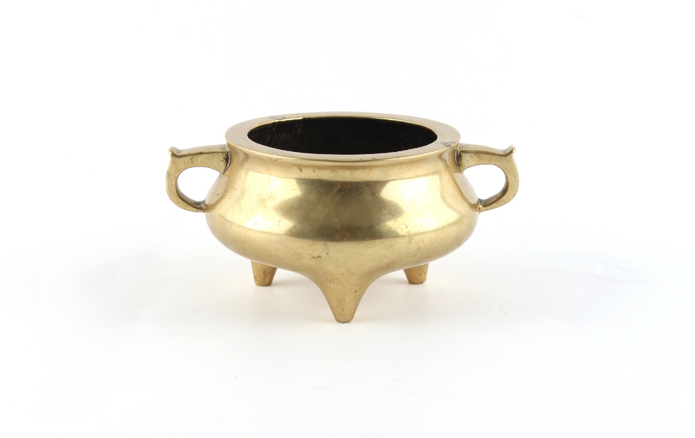 A Chinese bronze tripod censer, 18th / 19th century, with ring handles, 2-character mark to base,