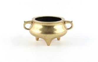 A Chinese bronze tripod censer, 18th / 19th century, with ring handles, 2-character mark to base,
