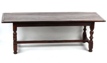 Property of a lady - an oak refectory table, the four plank top with cleated ends & turned