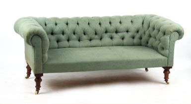 Property of a gentleman - a Victorian button upholstered chesterfield sofa with turned legs &