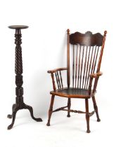 Property of a lady - a late 19th / early 20th century spindle-back elbow chair; together with a