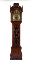 Property of a gentleman - a fine Edwardian carved mahogany cased 8-day chiming longcase clock, by