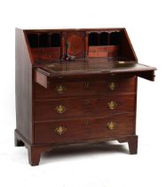 Property of a lady - a late 18th century George III mahogany fall-front bureau, with four long