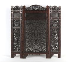 Property of a lady - an Indian or Middle Eastern carved wooden three panel screen, 30.25ins. (
