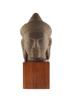 Property of a gentleman of title - a carved sandstone head of Buddha Muchalinda, Khmer Empire,