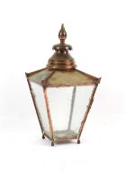 Property of a lady - a Victorian copper street lantern, 34ins. (86cms.) high; with iron wall bracke.