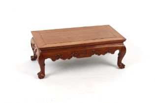 A late 19th / early 20th century Chinese carved hardwood possibly huanghuali kang table, 30.5ins. (