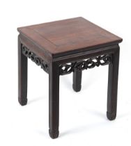 A late 19th century Chinese hongmu table with carved frieze, 17.75 by 17.5ins. (45 by 44.5cms.).