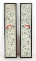 Property of a gentleman - a pair of Chinese embroidered silk sleeve panels, early 20th century, in