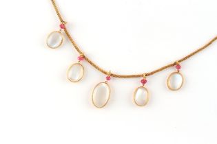 A yellow gold moonstone & ruby fringe necklace, 15.5ins. (39.5cms.) long.