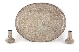 Property of a gentleman - an Indian silver (tested) oval tray, decorated in relief with leaves &