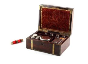 Property of a lady - a Victorian brass bound rosewood vanity case or dressing box, with part silver,