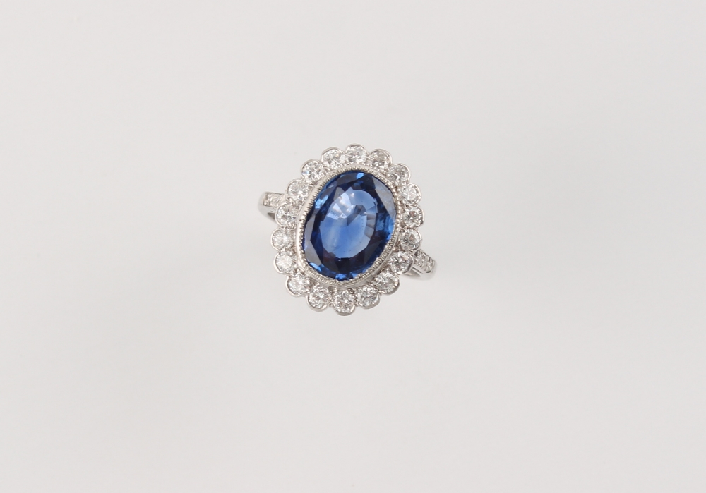 A good certificated untreated Ceylon sapphire & diamond oval cluster ring, the oval cut sapphire - Image 2 of 3