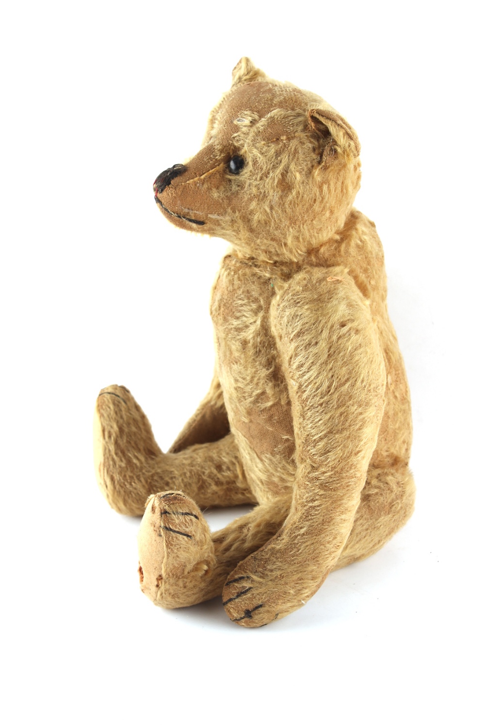 Property of a lady - an early 20th century teddy bear, circa 1905, with worn mohair, long muzzle &