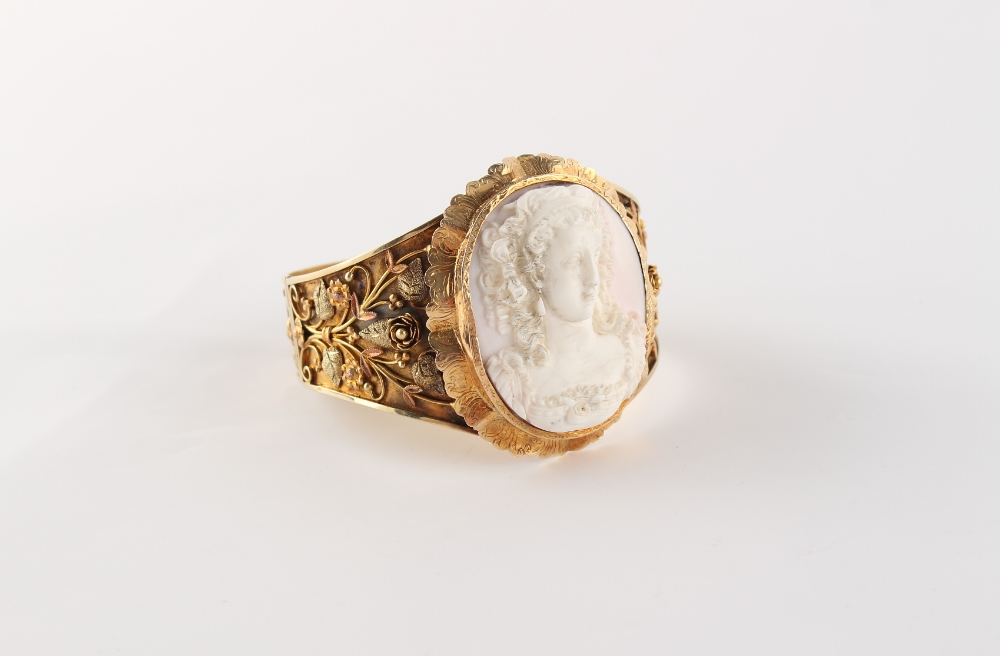 A good late 19th century three colour gold (tests 14ct) hinged bangle set with a carved shell - Image 4 of 4
