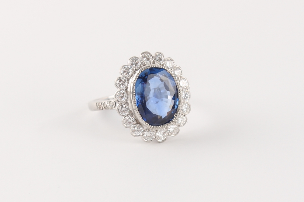 A good certificated untreated Ceylon sapphire & diamond oval cluster ring, the oval cut sapphire - Image 3 of 3