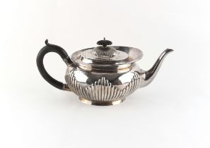 Property of a gentleman - a Victorian silver oval teapot with fluted decoration, Edward Hutton,