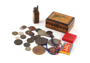 Property of a lady - a small quantity of coins & badges; together with a Chinese carved soapstone