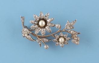 A late 19th century diamond & seed pearl floral spray brooch, approximately 40mm long.