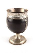 Property of a deceased estate - a 17th century unmarked silver mounted coconut cup, the rim engraved